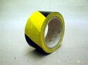 PVC lepicí páska - 50 mm x 66 m - "žlutočerné pruhy"